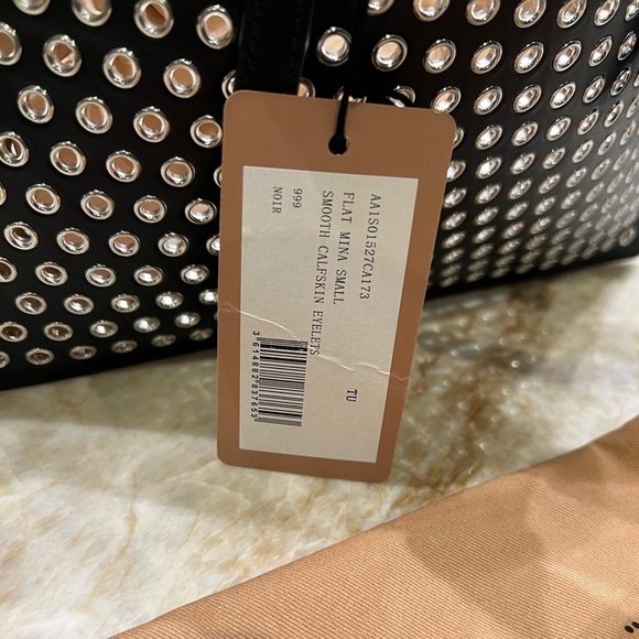 ALAÏA Mina Small perforated leather tote bag - Picture 12 of 14